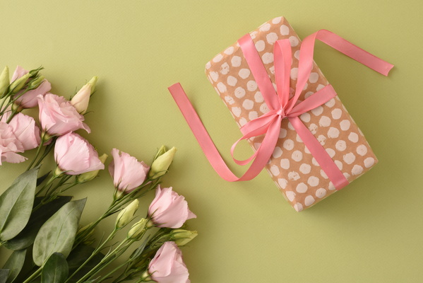 Present with Bow and Pink Flowers